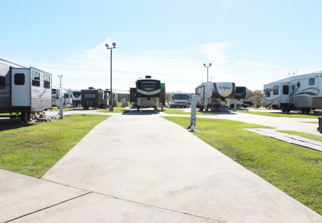 Image of a pull through RV site with a nice driveway at Port Arthur RV resort